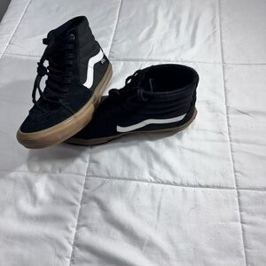 Vans Black and White High-Top Sneakers